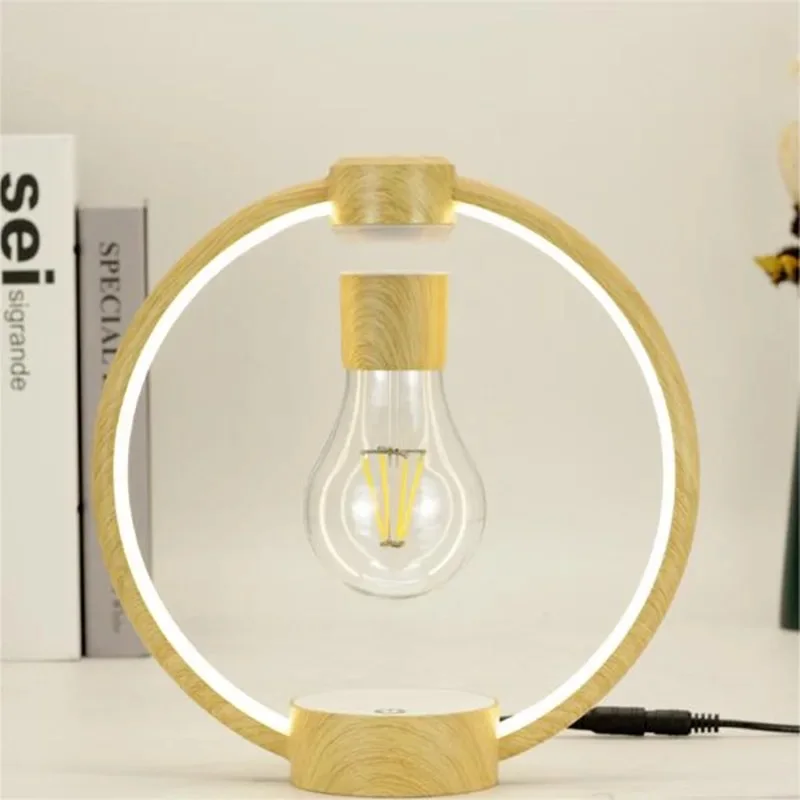 Zwevende lamp met lichtring en filamentlamp